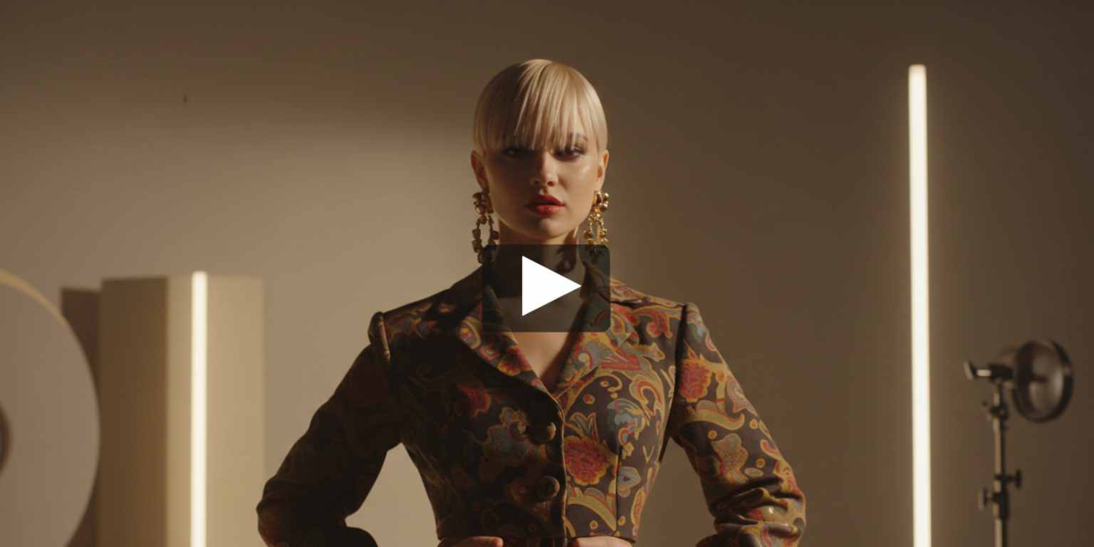 TikTok preview showing a slow pan across a fashion image